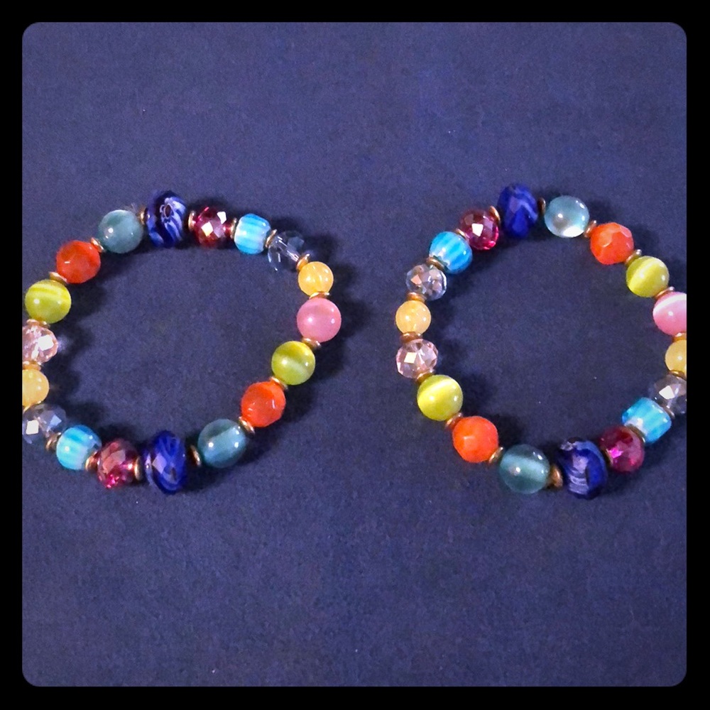 Two multi-colored bracelets..